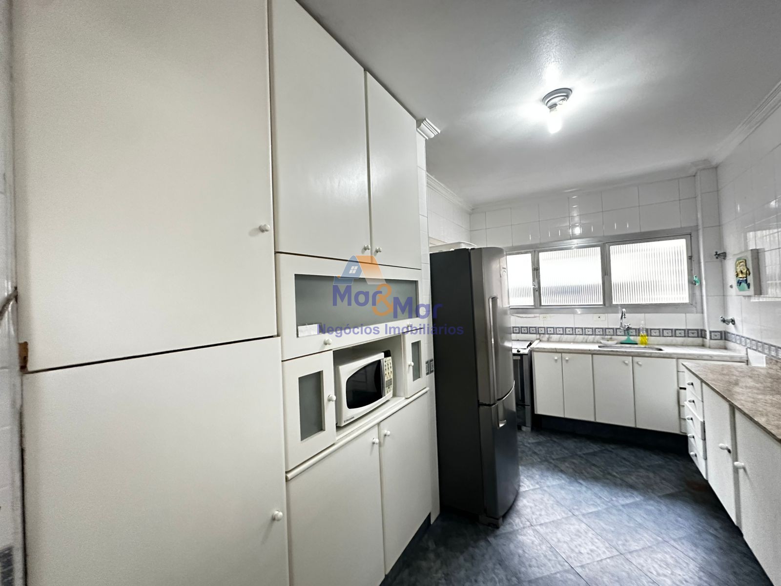 Apartamento na Praia das Pitangueiras, Guarujá - SP